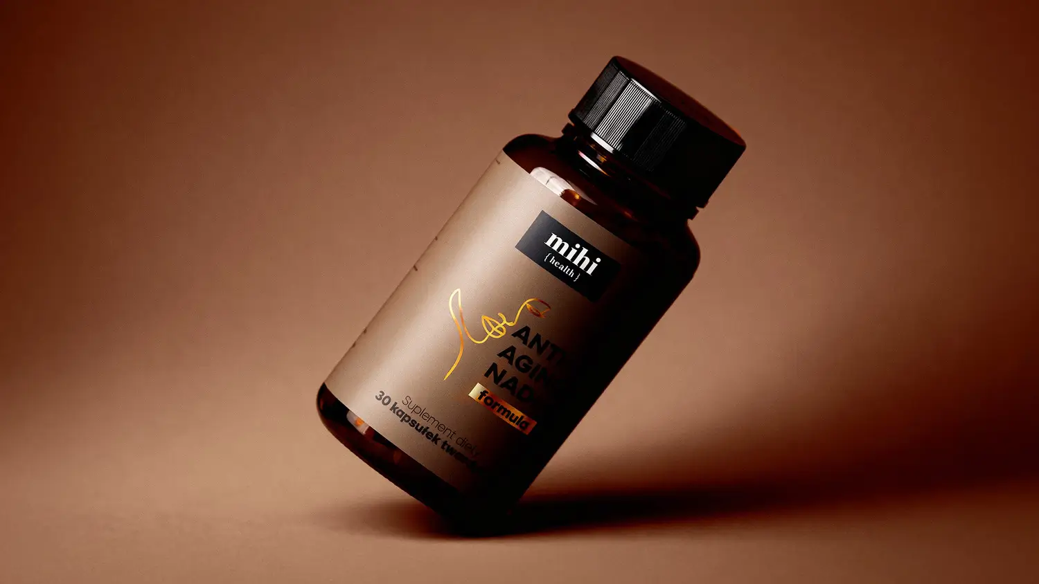 Flacon du Complexe de protection cellulaire MIHI (Vitamins 100232) entouré d'ingrédients antioxydants comme le Q10 et l'Ashwagandha.